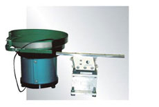 Vibratory parts feeder and straight line feeder